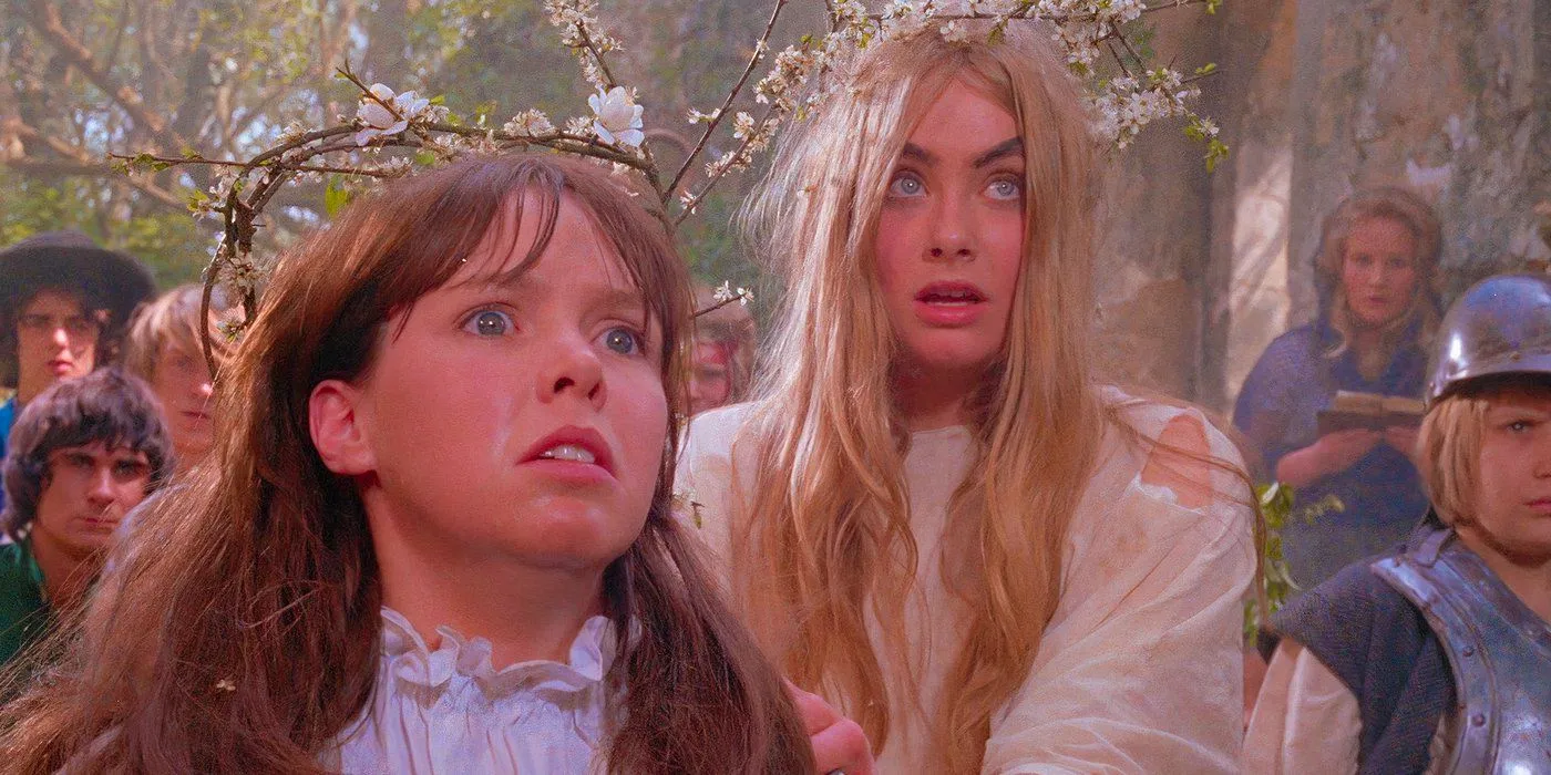 Michele Dotrice, Linda Hayden, and Wendy Padbury in The Blood on Satan's Claw (1971) in a forest, both looking terrified  Image