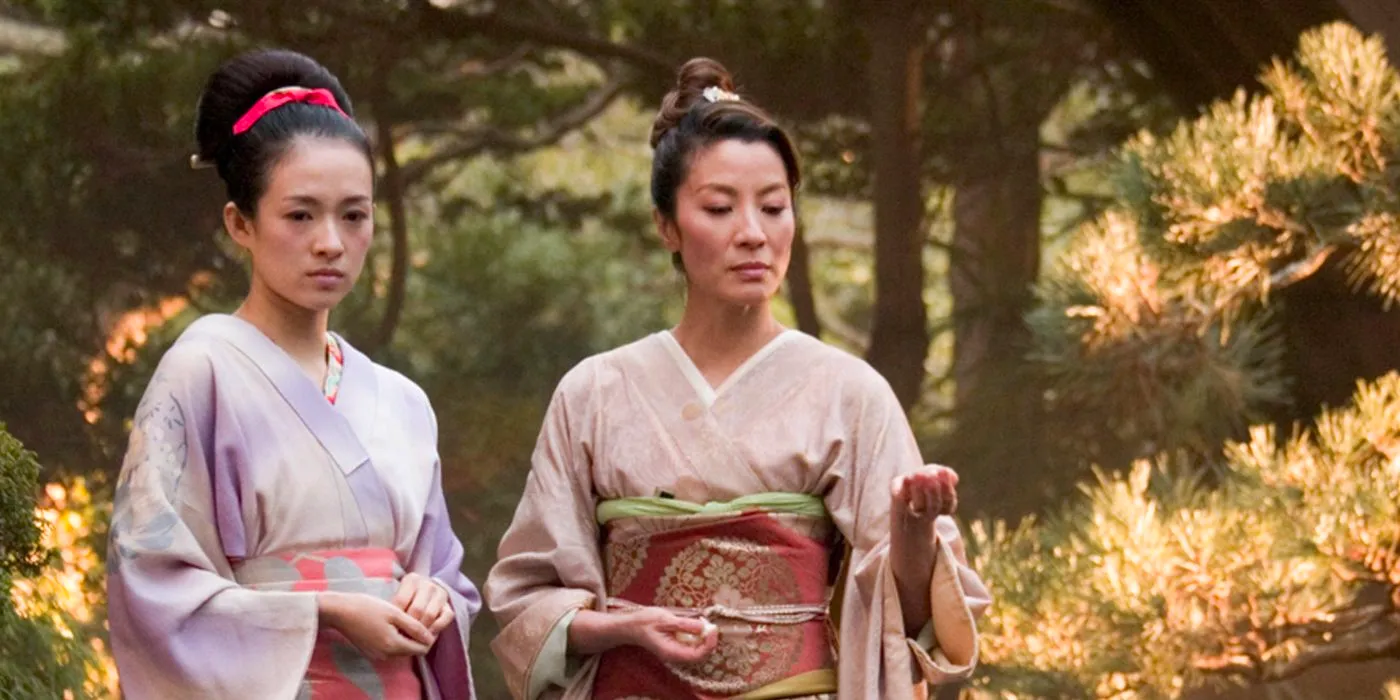 Michelle Yeoh and Ziyi Zhang in the garden in Memoirs Of A Geisha. Image