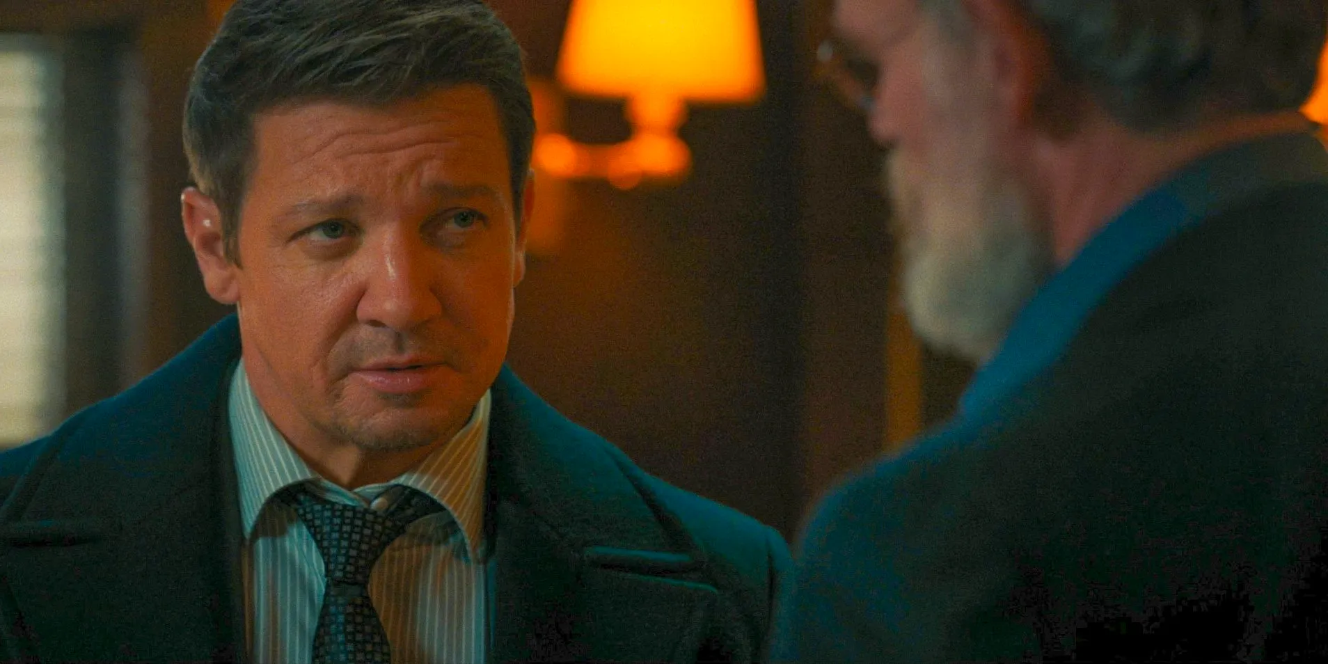 Mike (Jeremy Renner) having a conversation with Konstantin in Mayor of Kingstown Season 3 Episode 10 Image