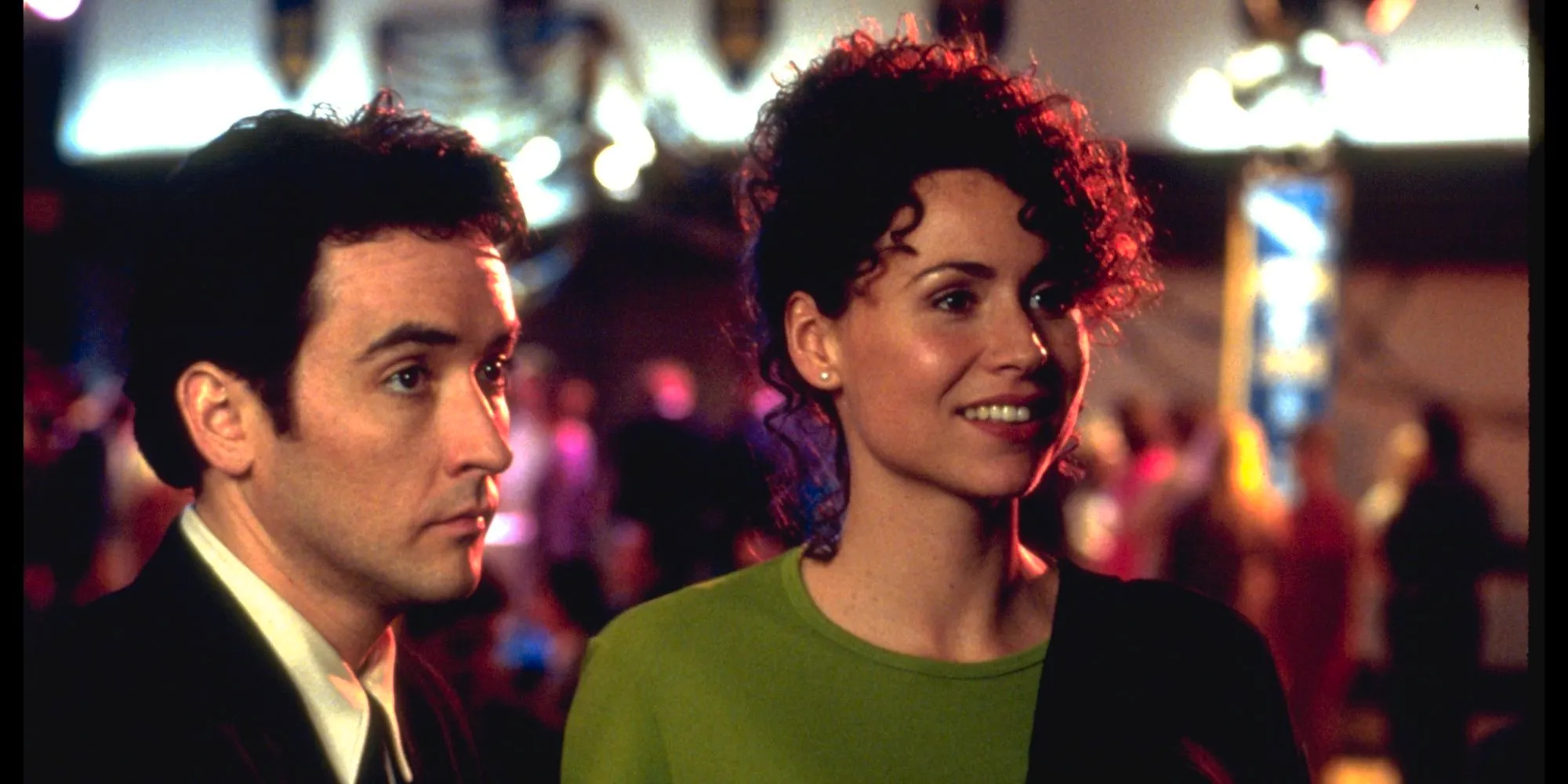 Minnie Driver and John Cusack in Grosse Point Blank Image