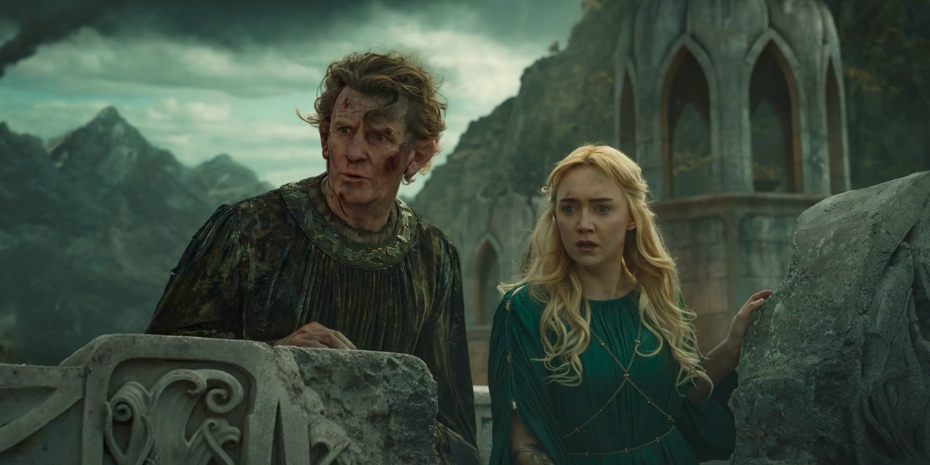 Mirdania (Amelia Kenworthy) and Celebrimbor (Charles Edwards) watching the attacks on Eregion in The Lord of the Rings: The Rings of Power Season 2 Episode 7 Image