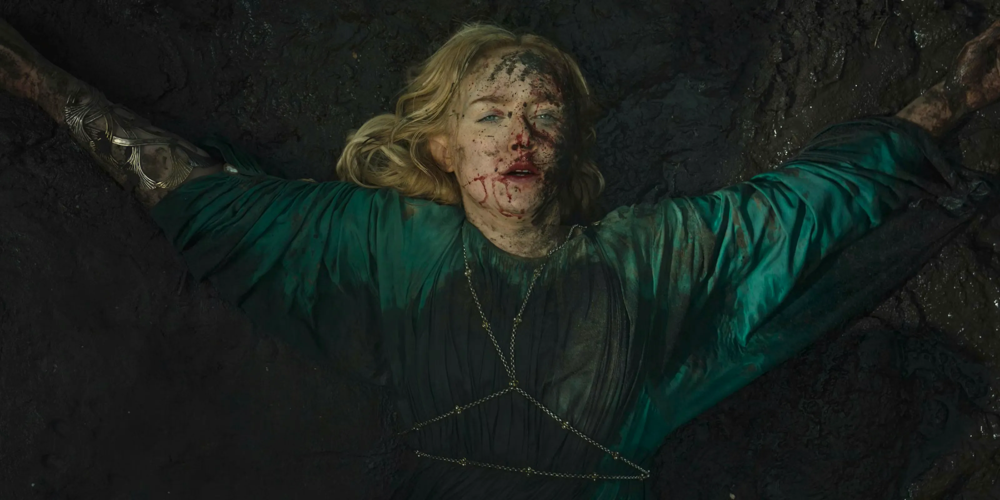 Mirdania (Amelia Kenworthy) lying dead on the ground in The Lord of the Rings: The Rings of Power Season 2 Episode 7 Image