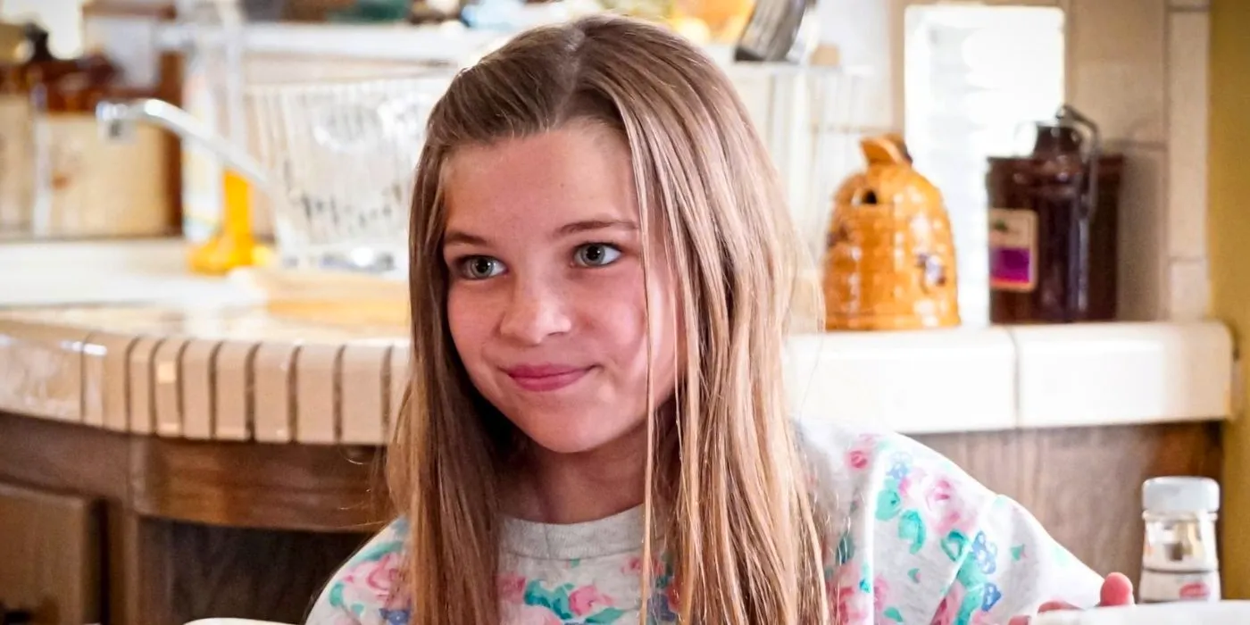 Missy smiling in her kitchen in Young Sheldon Image