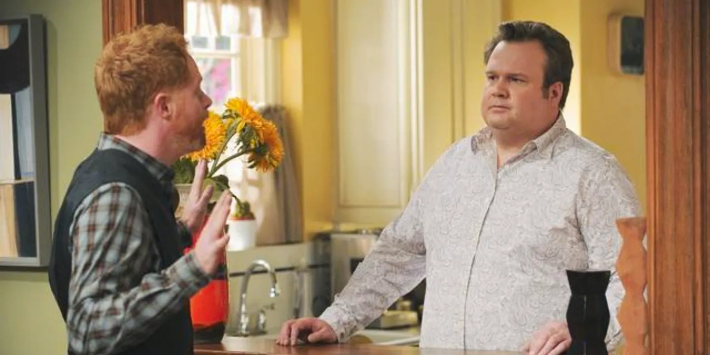 Mitch argues with Cam about the kitchen on Modern Family Image