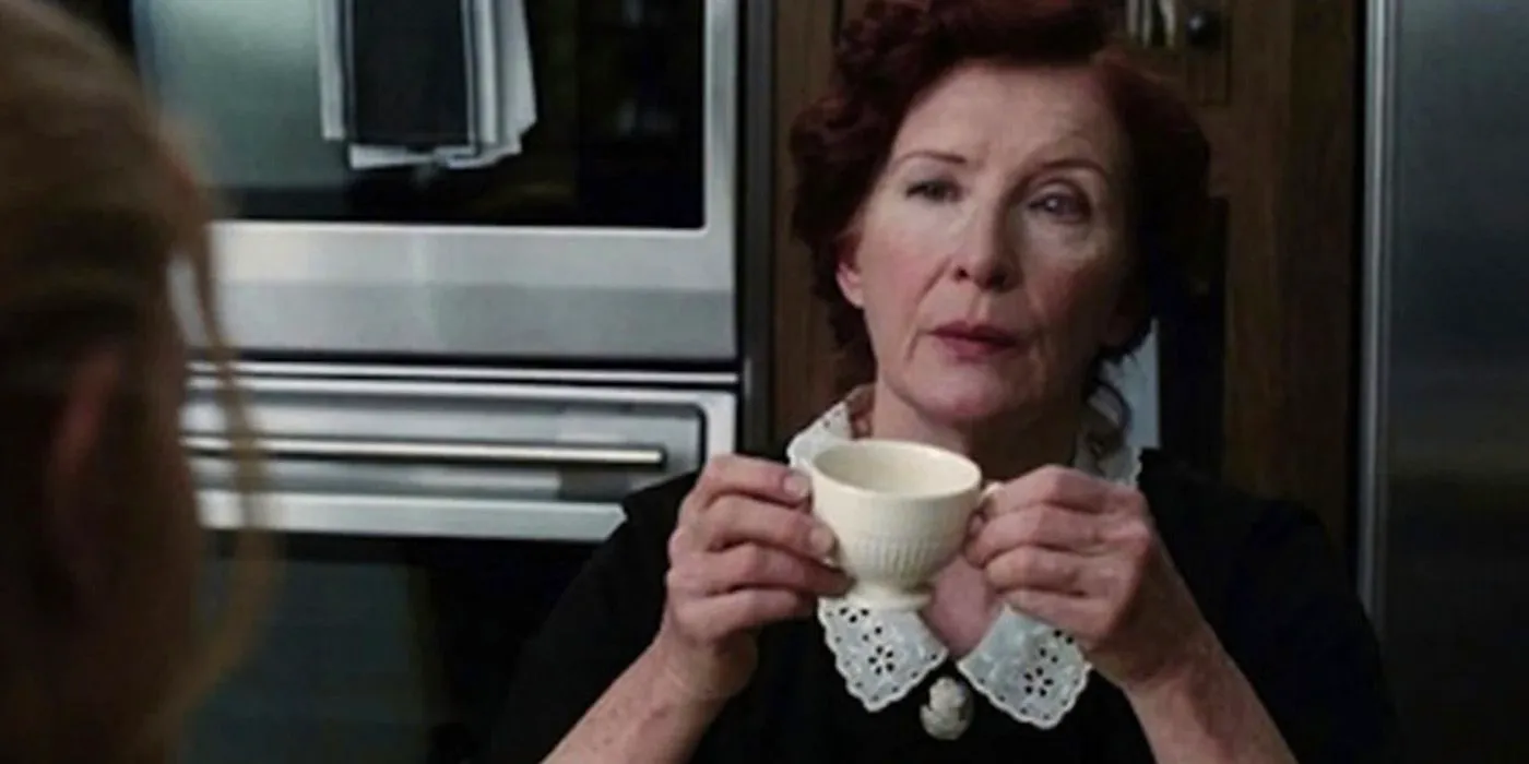 Moira O'Hara with coffee in American Horror Story Image