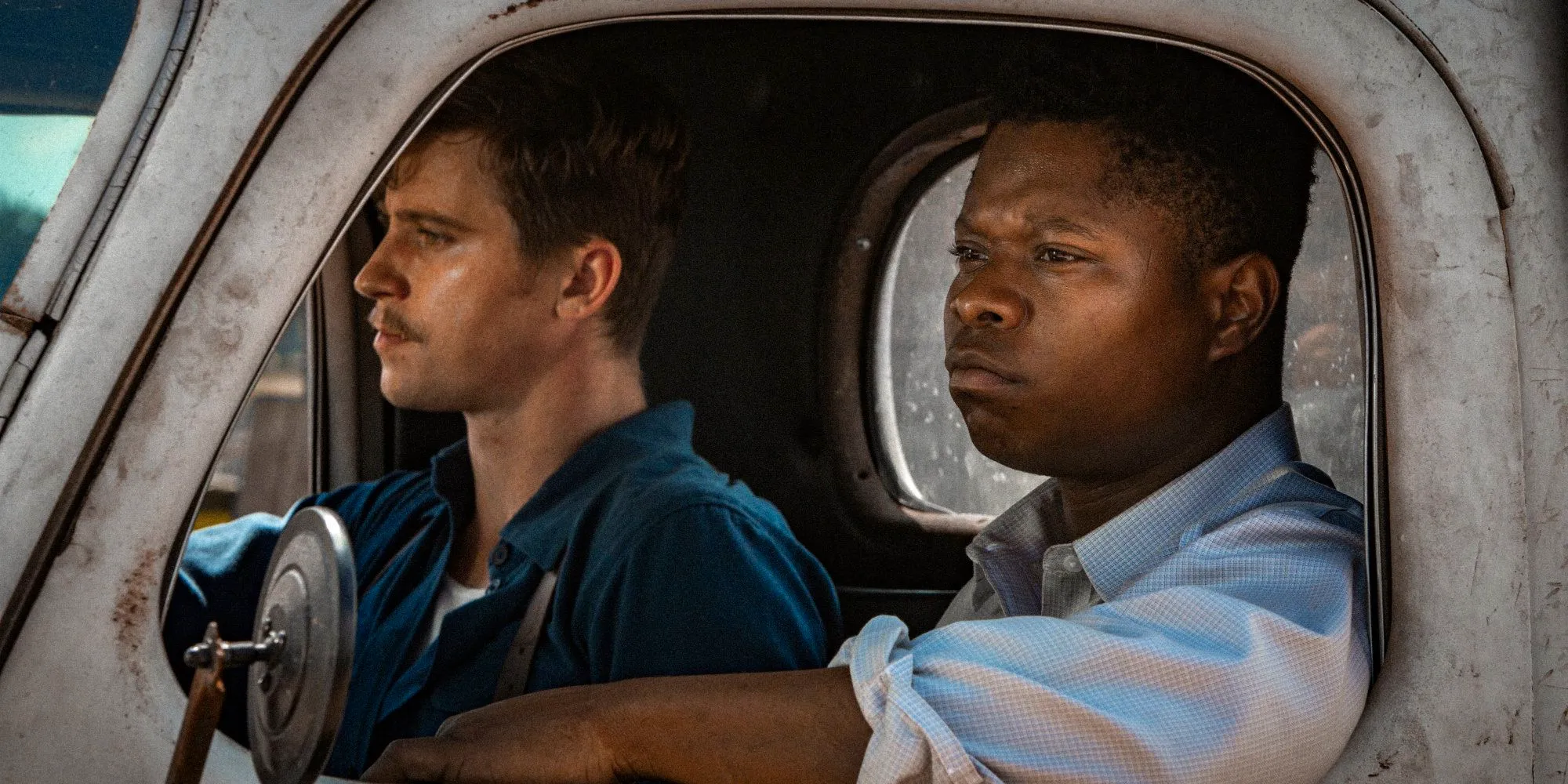 Mudbound Jason Mitchell and Garrett Hedlund in a car Image