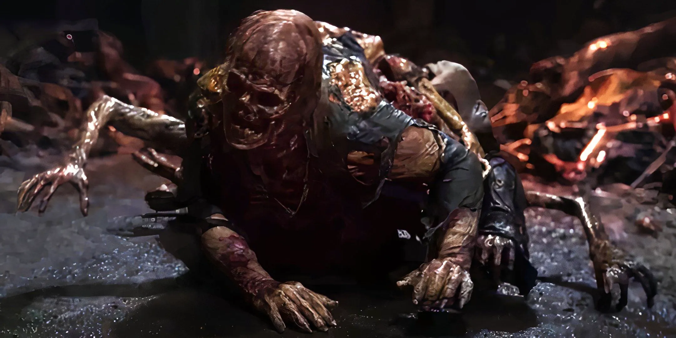 Mutated zombie with several limbs from The Walking Dead: Dead City Image