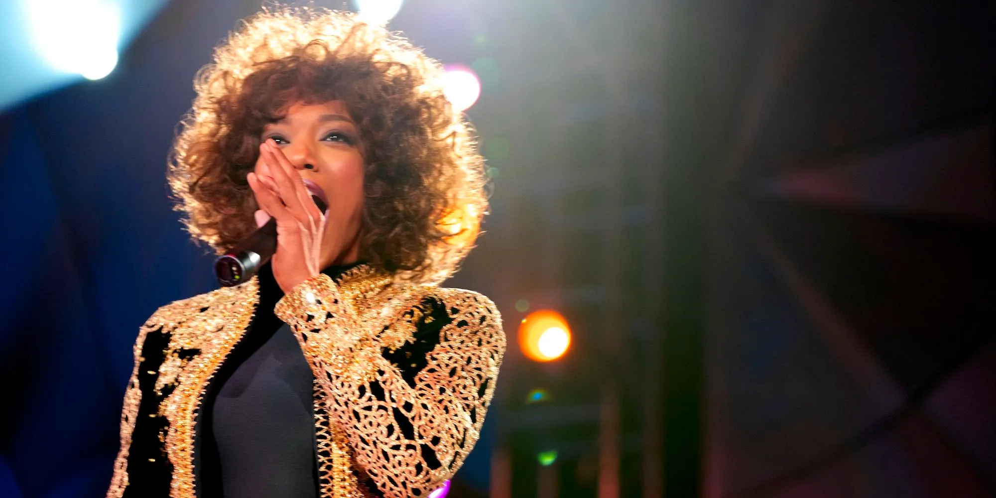 Naomi Ackie in black and gold as Whitney Houston in I Wanna Dance With Somebody Image