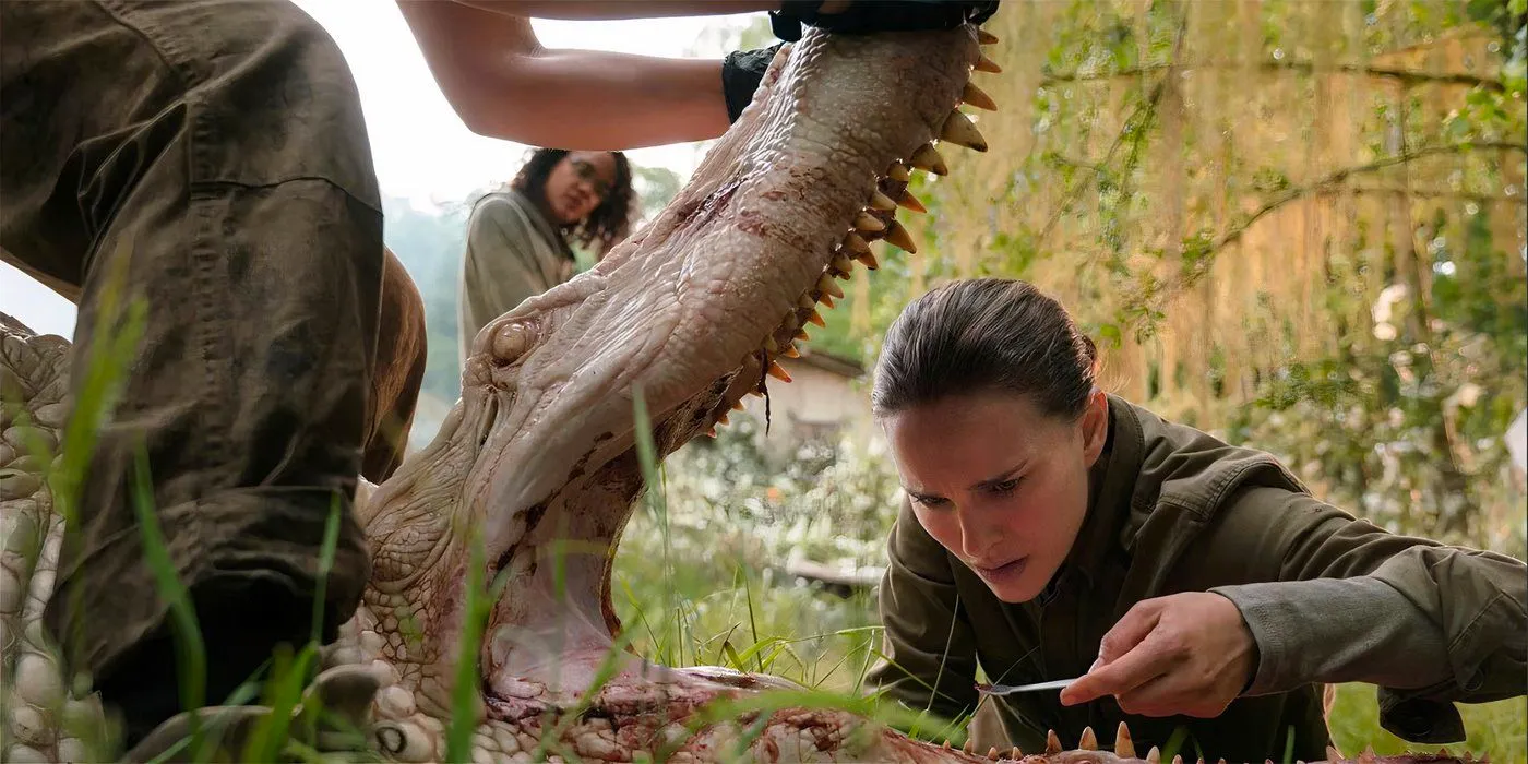 Natalie Portman as Lena analyzing a mutated alligator in Annihilation Image