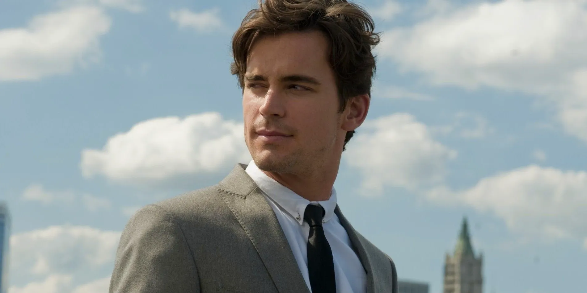 Neal looking over his shoulder in White Collar Image