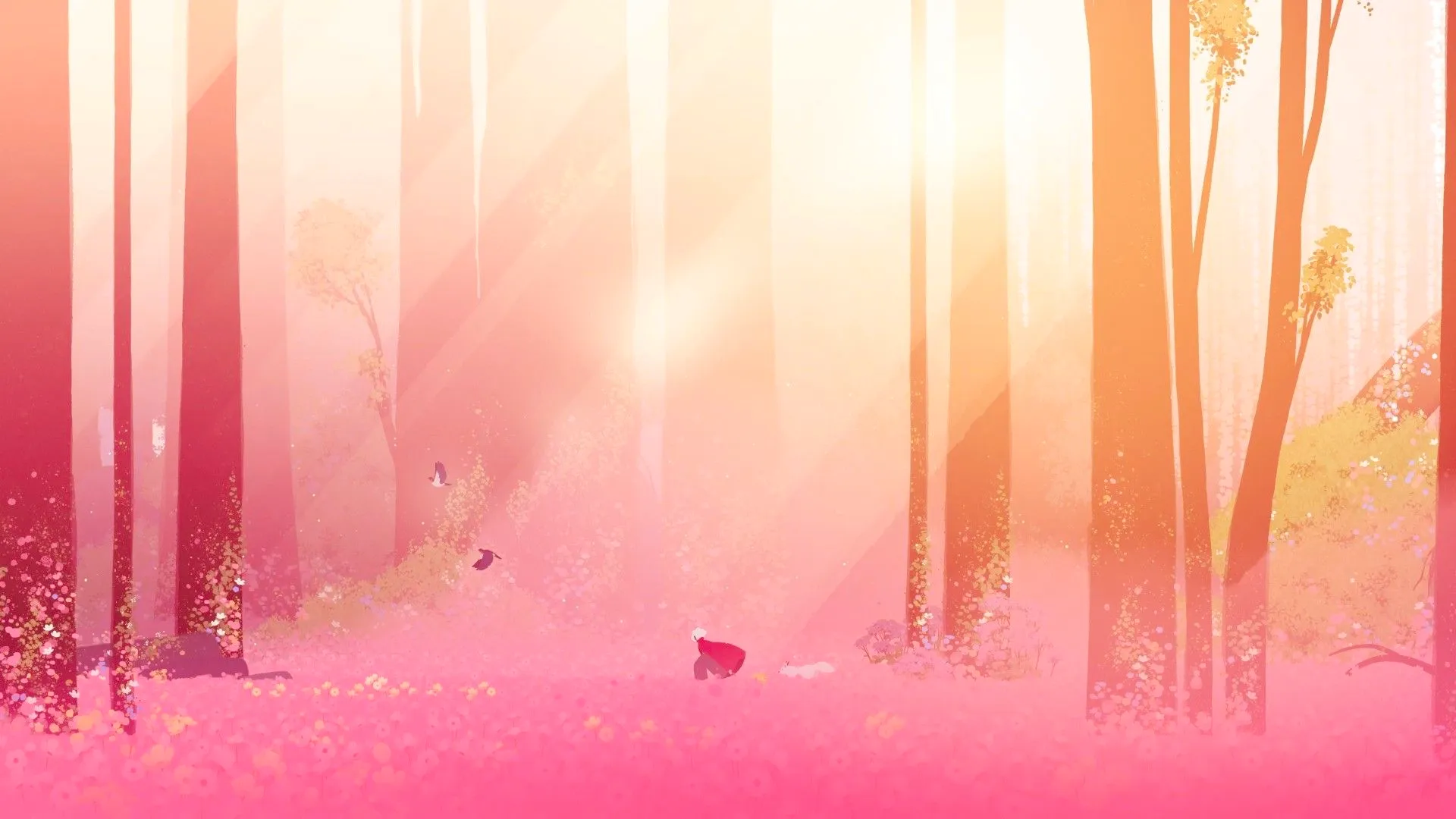 Neva and Alba running through a very pink field of flowers in the woods with very tall trees around them. Image