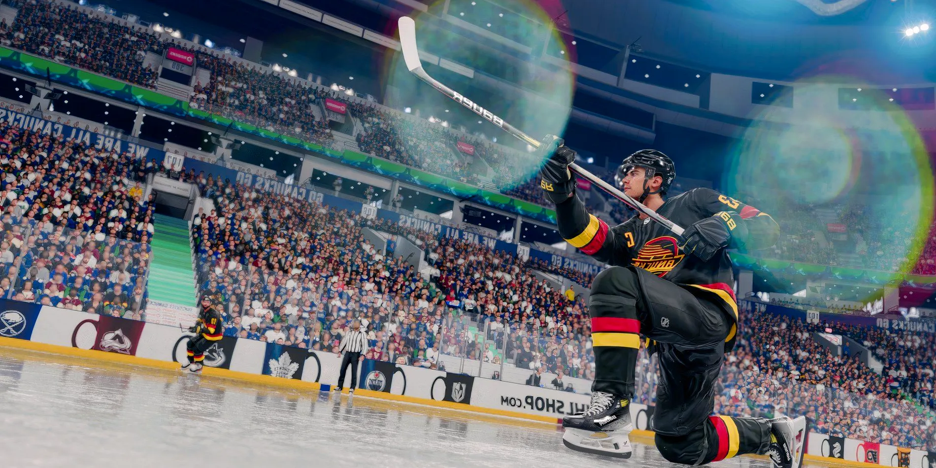 NHL 25 gameplay screenshots showing a One Timer shot by Quinn Hughes after he's launched the puck and his stick is in the air. Image