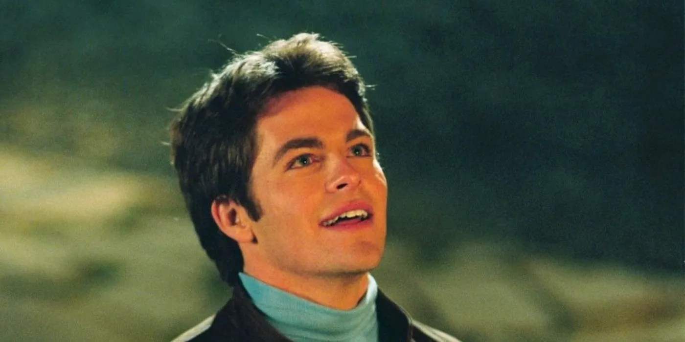 Nicholas (Chris Pine) looking up and smiling in The Princess Diaries 2. Image