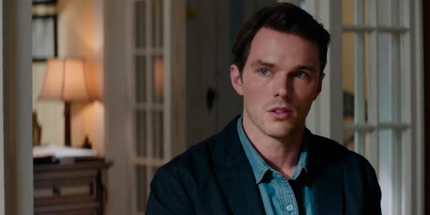 Nicholas Hoult Juror #2 Justin sitting in living room looking concerned  Image