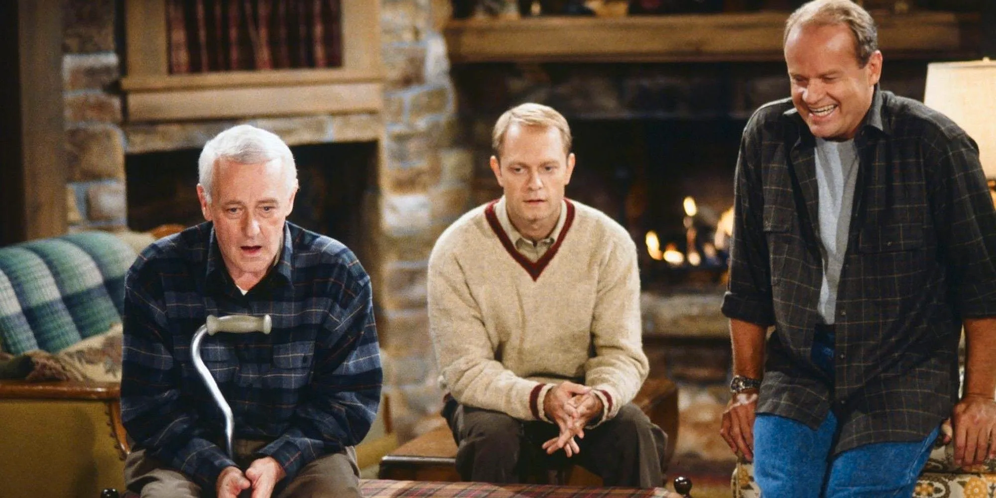 Niles Martin Crane all sitting in the living room in a cabin in Frasier Image