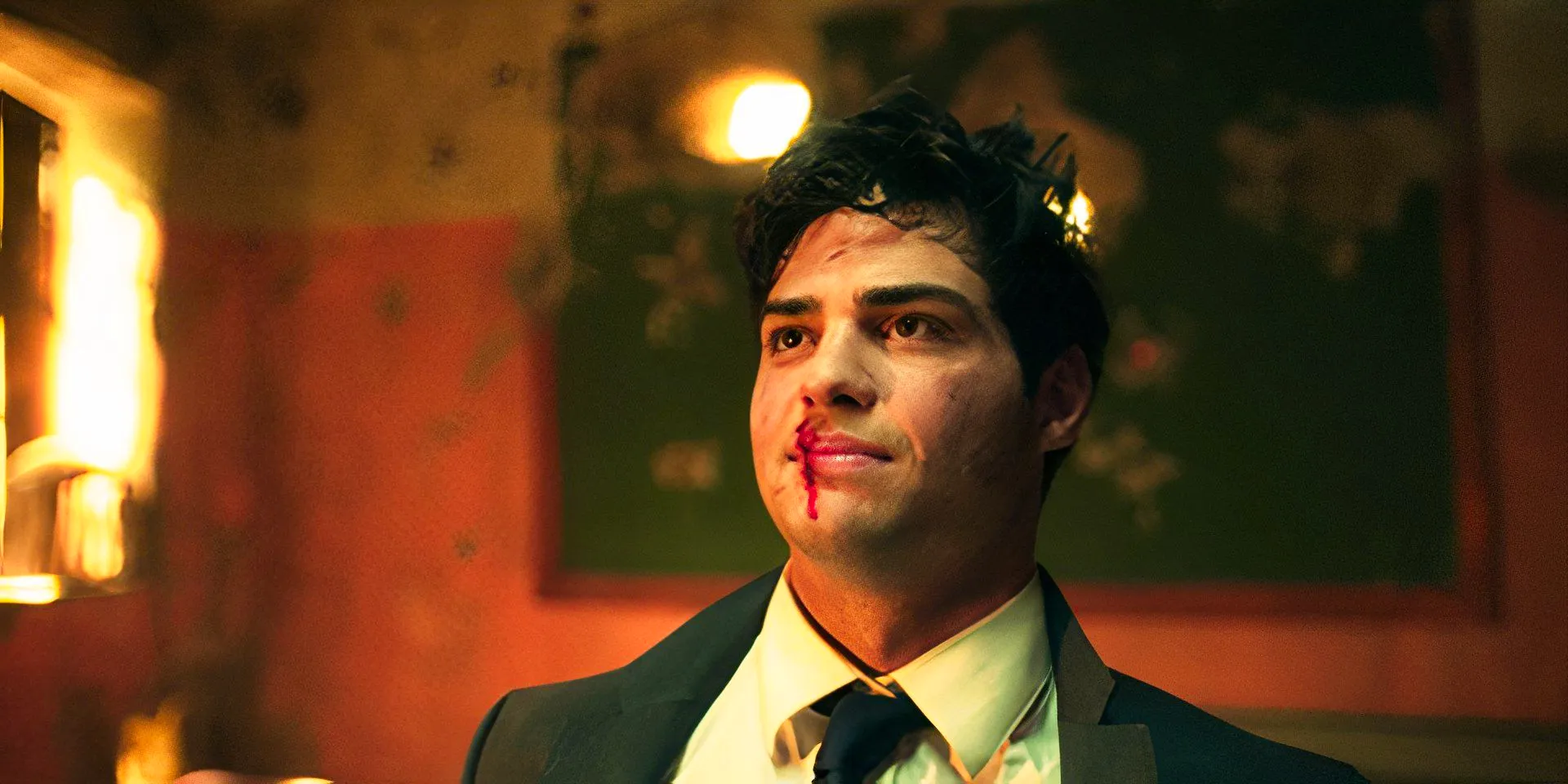 Noah Centineo as Owen looking bloody in The Recruit season 1 Image