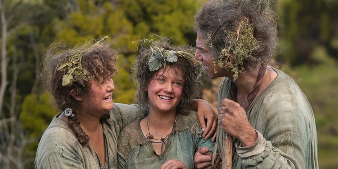 Nori and her family smiling and embracing in The Rings of Power. Image