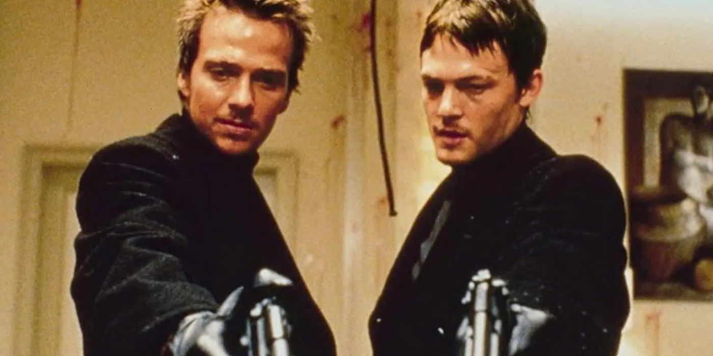 Norman Reedus and Sean Patrick Flanery pointing guns in The Boondock Saints (1999). Image