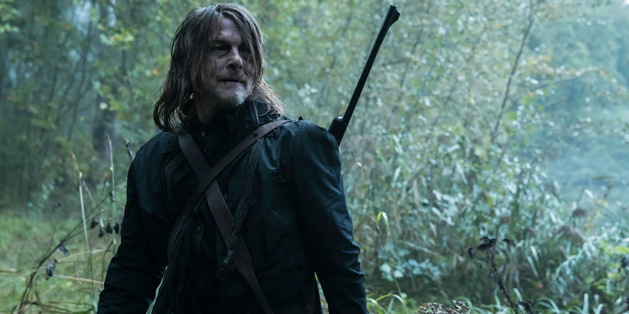 Norman Reedus as Daryl standing in the woods in Walking Dead Daryl Dixon season 2 Image