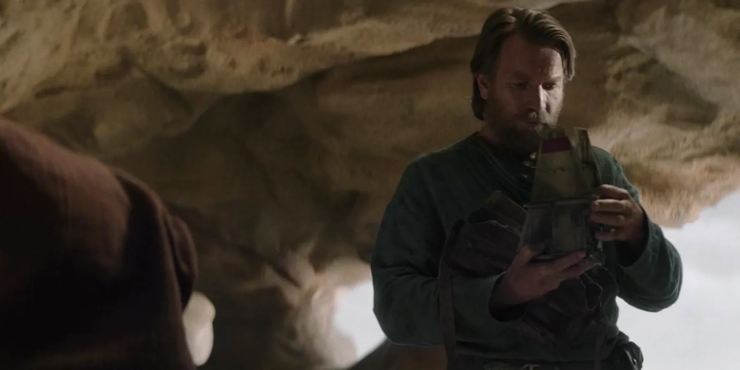 Obi-Wan holding the Skyhopper toy in the Obi-Wan Kenobi show Image