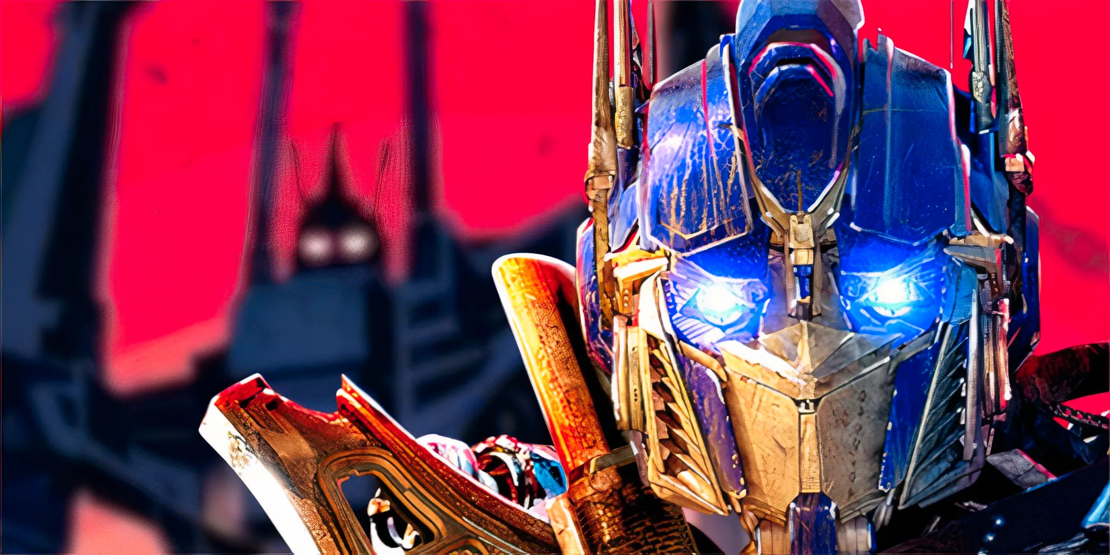 Optimus Prime (left, foreground) and the silhouette of Bruticus (right, background.) Image