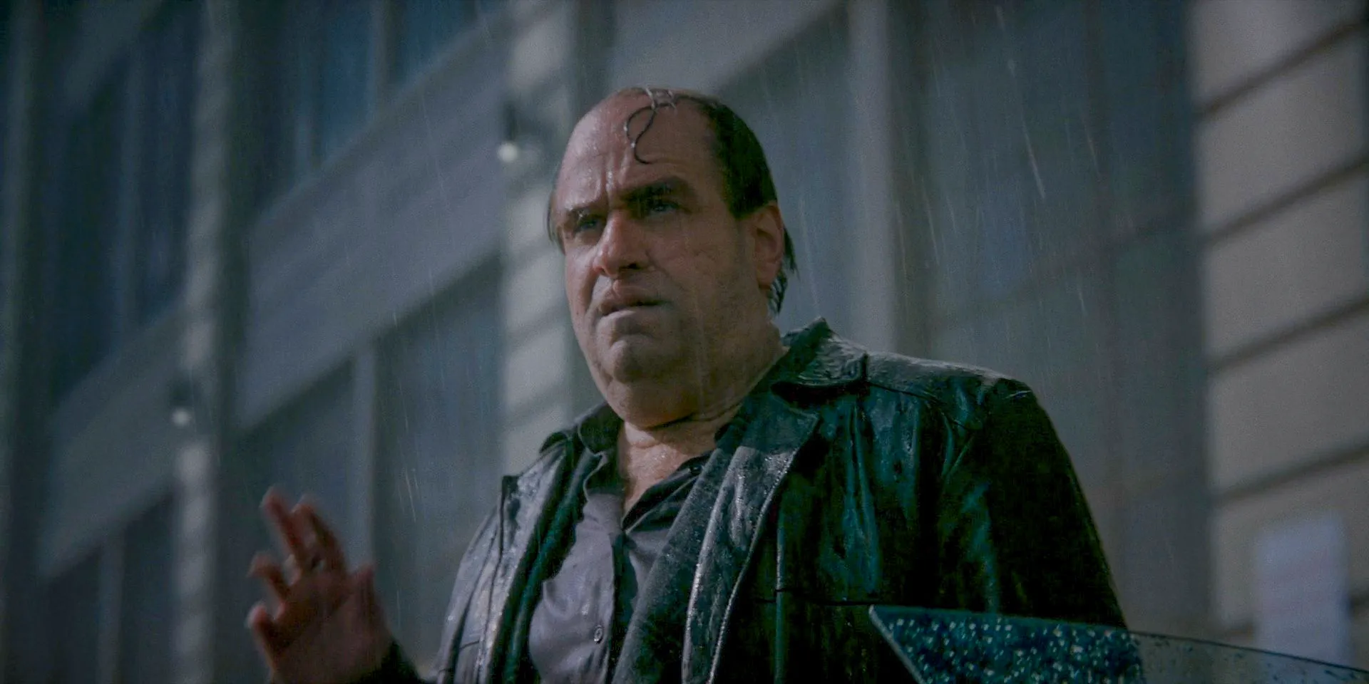 Oz Cobb/The Penguin (Colin Farrell) in the rain in The Penguin Season 1 Episode 1 Image