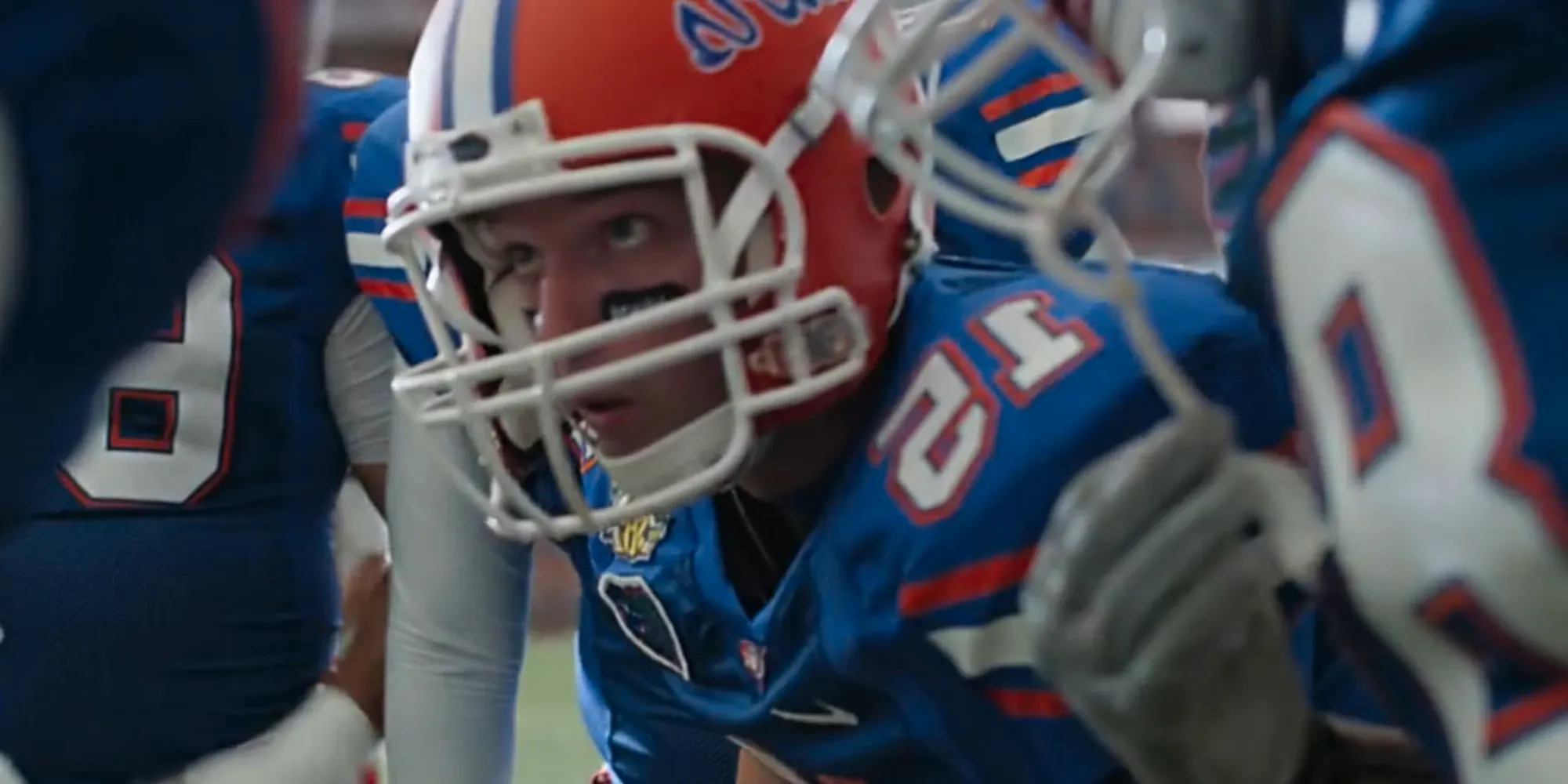 Patrick Schwarzenegger in the huddle as Tim Tebow in American Sports Story Image