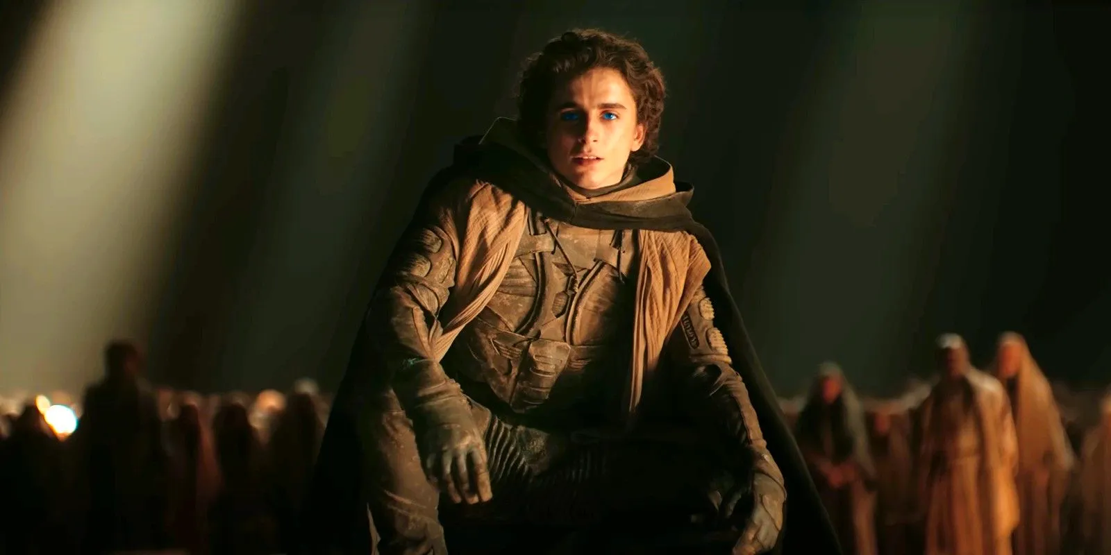 Paul Atreides played by actor Timothée Chalamet looking at the Fremen as he gives his speech in Dune 2 Image