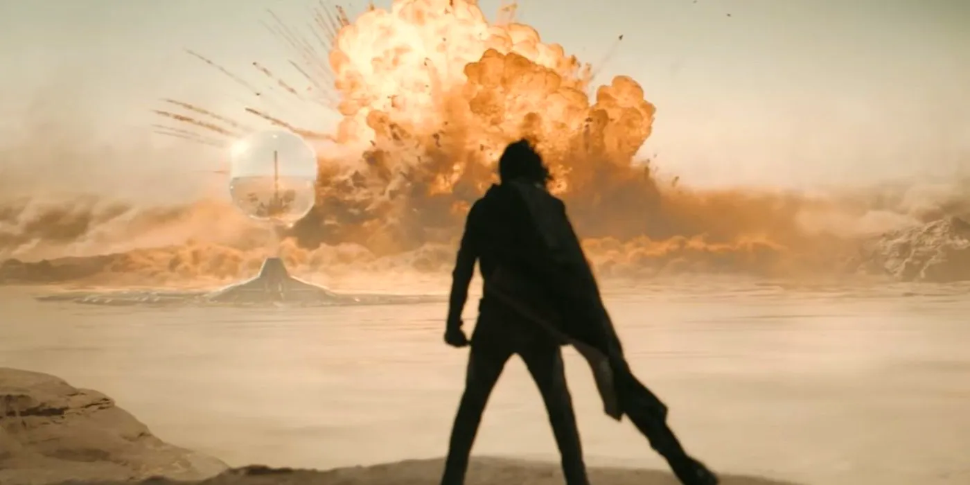 Paul standing in front of an atomic bomb explosion in Dune Part Two Image