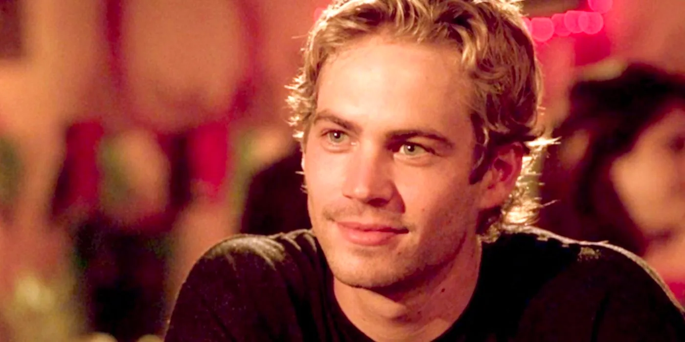 Paul Walker smiling as Brian O'Connor in Fast and Furious. Image