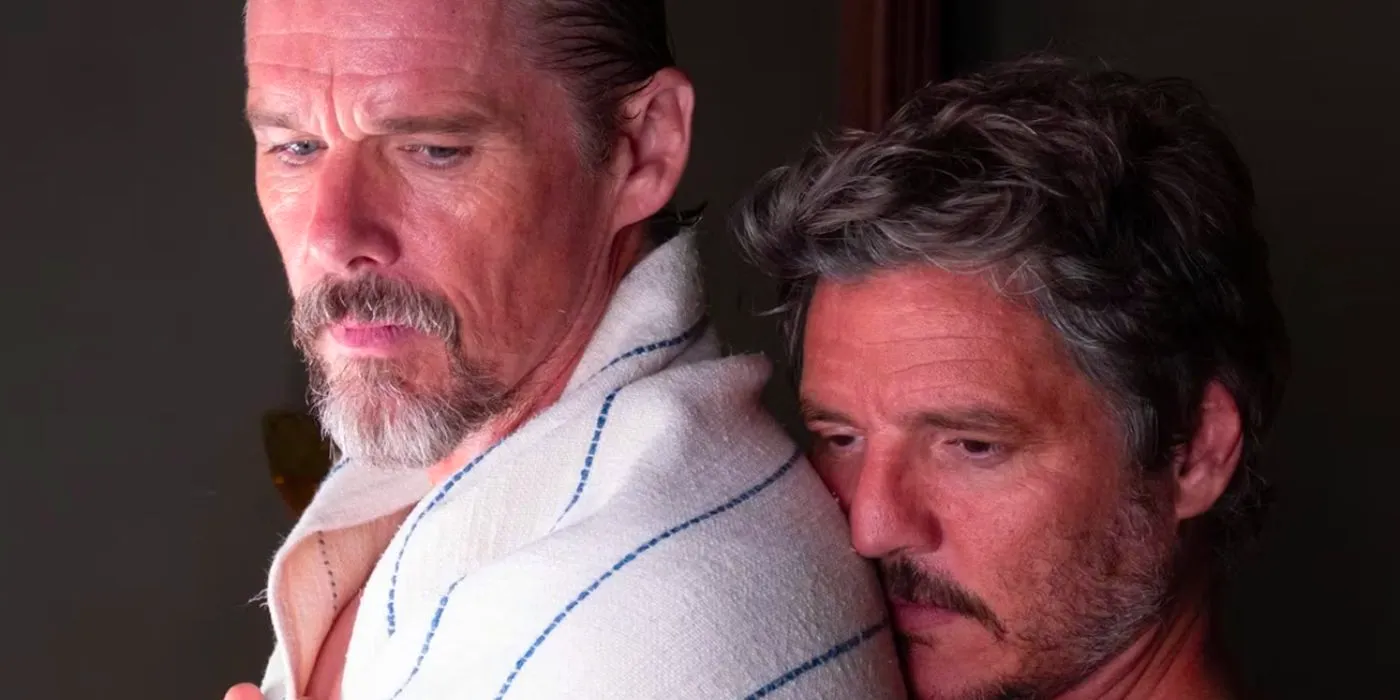 Pedro Pascal holds Ethan Hawke in Strange Way Of Life Image