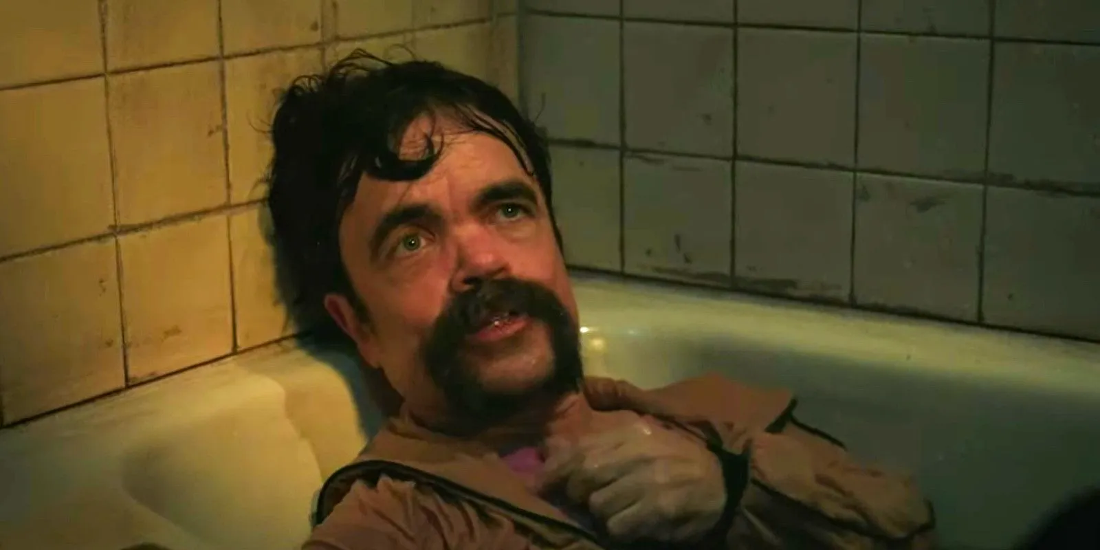 Peter Dinklage sitting in a bathtub in Brothers Image