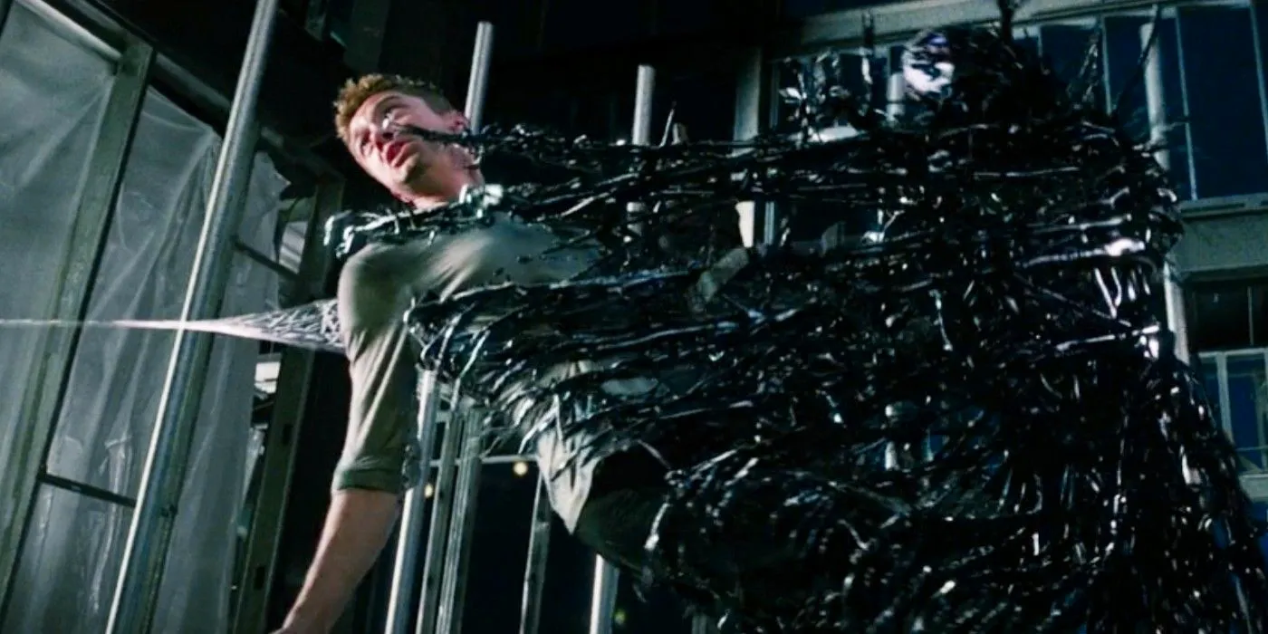 Peter Parker pulls Eddie Brock out of the Venom symbiote in Spider-Man 3 Image