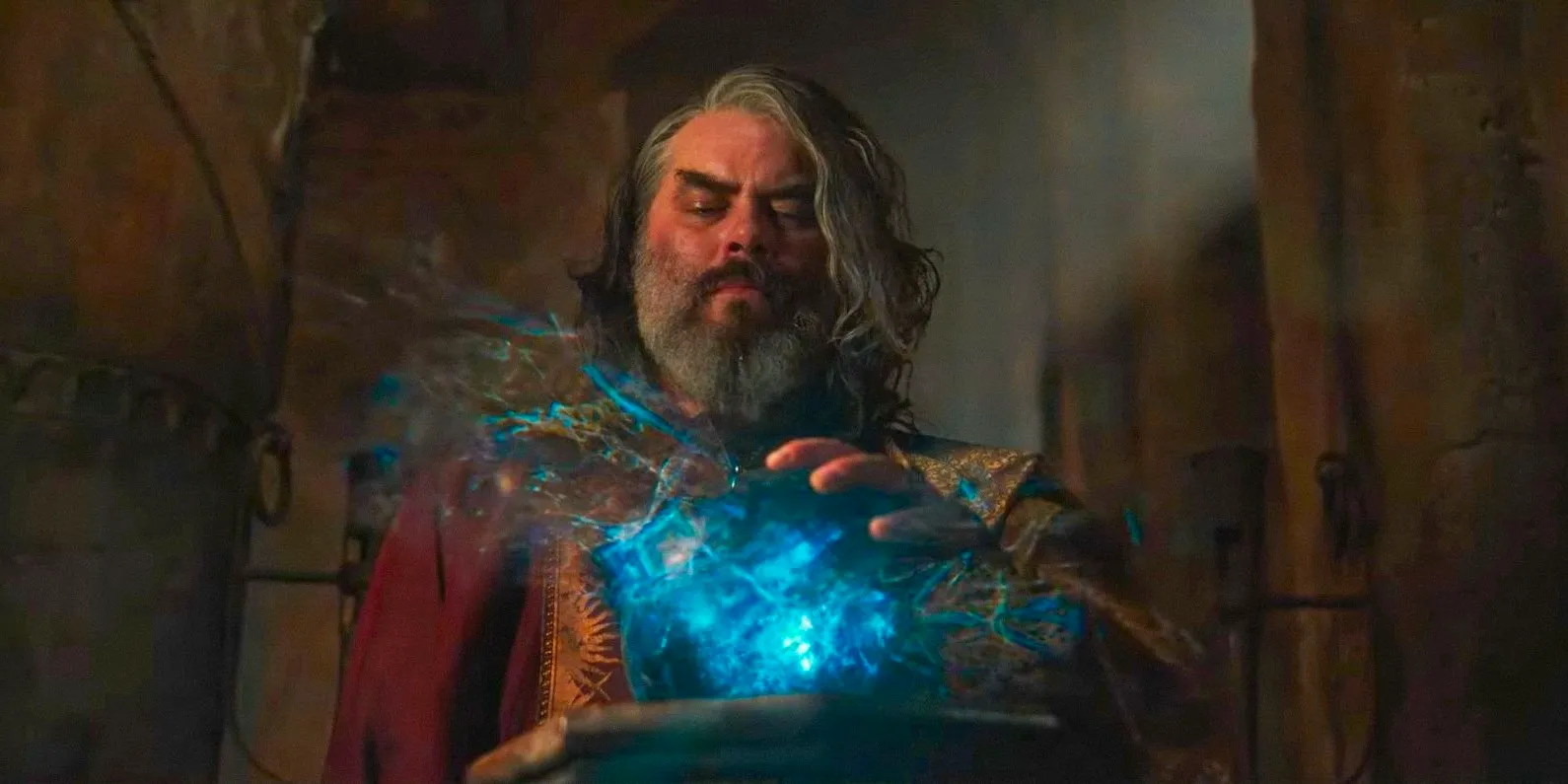 Pharazôn entranced by a palantir in The Lord of the Rings: The Rings of Power Season 2 Image