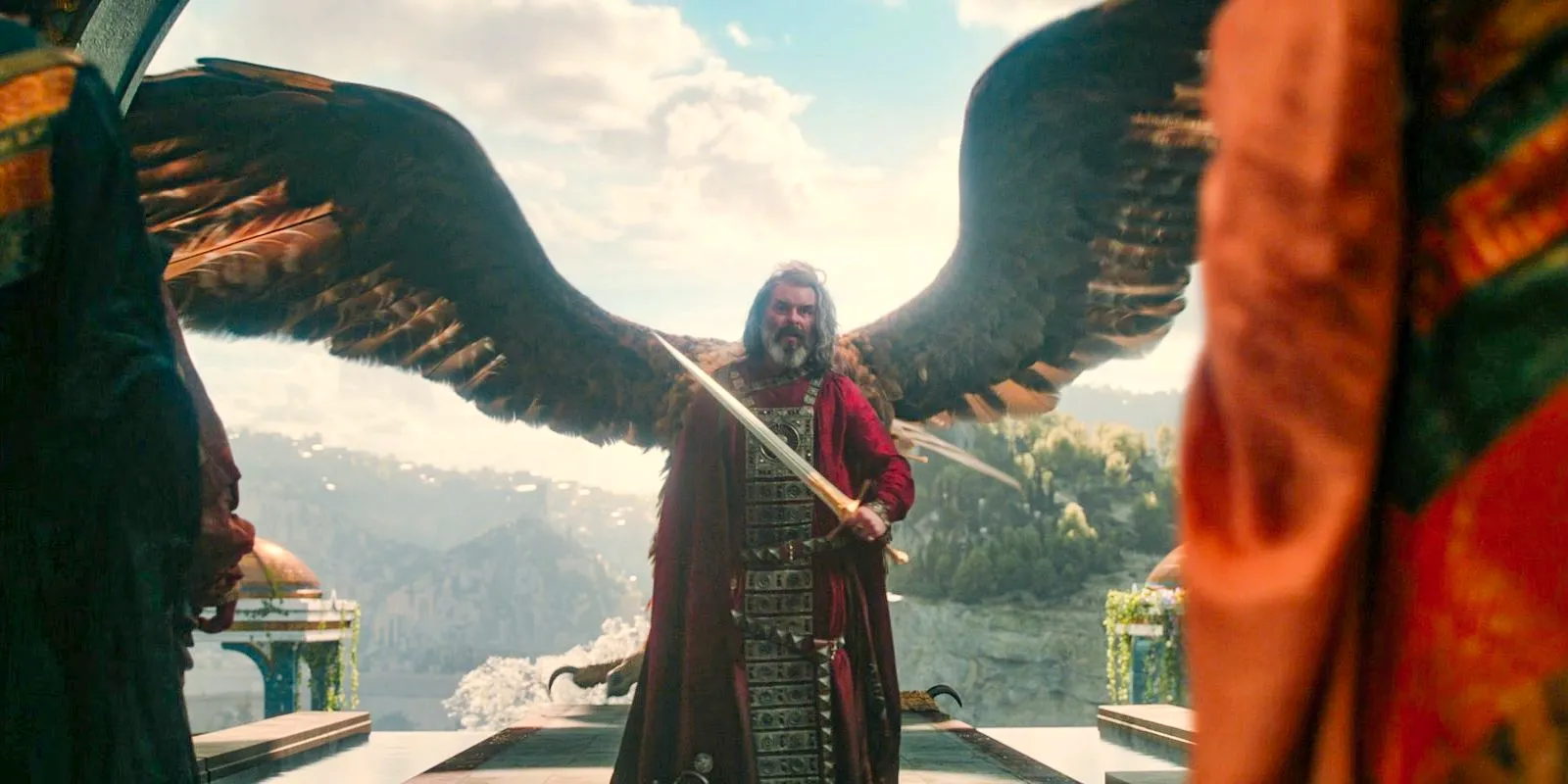 Pharazôn (Trystan Gravelle) wielding a sword, and a great eagle in The Lord of the Rings: The Rings of Power Season 2 Episode 3 Image