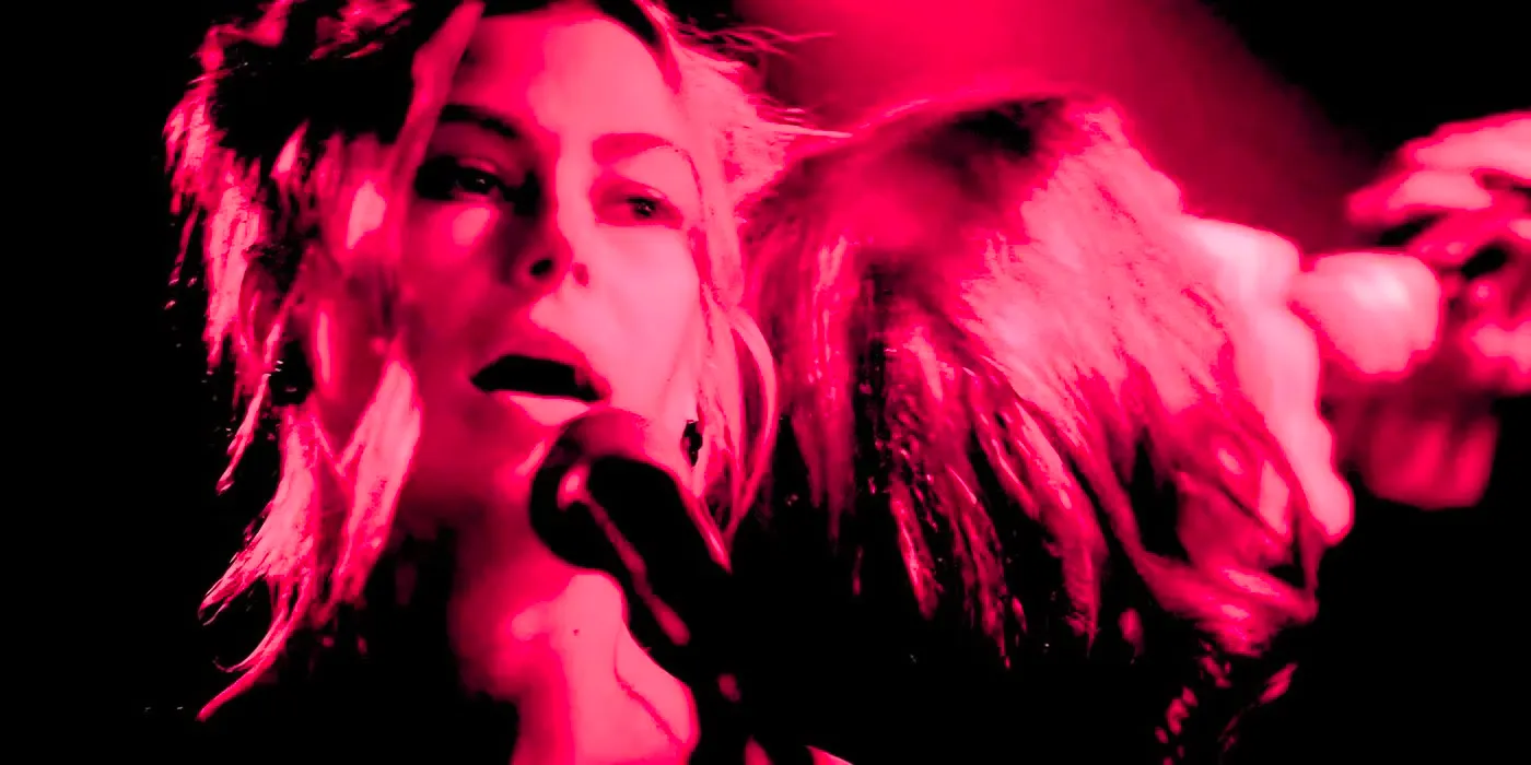 Phoebe Bridgers and Sloppy Jane perform in the bar in I Saw the TV Glow Image