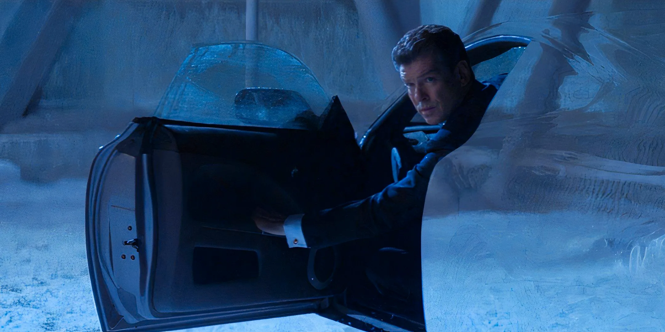 pierce brosnan as james bond peering out of invisible car in die another day Image