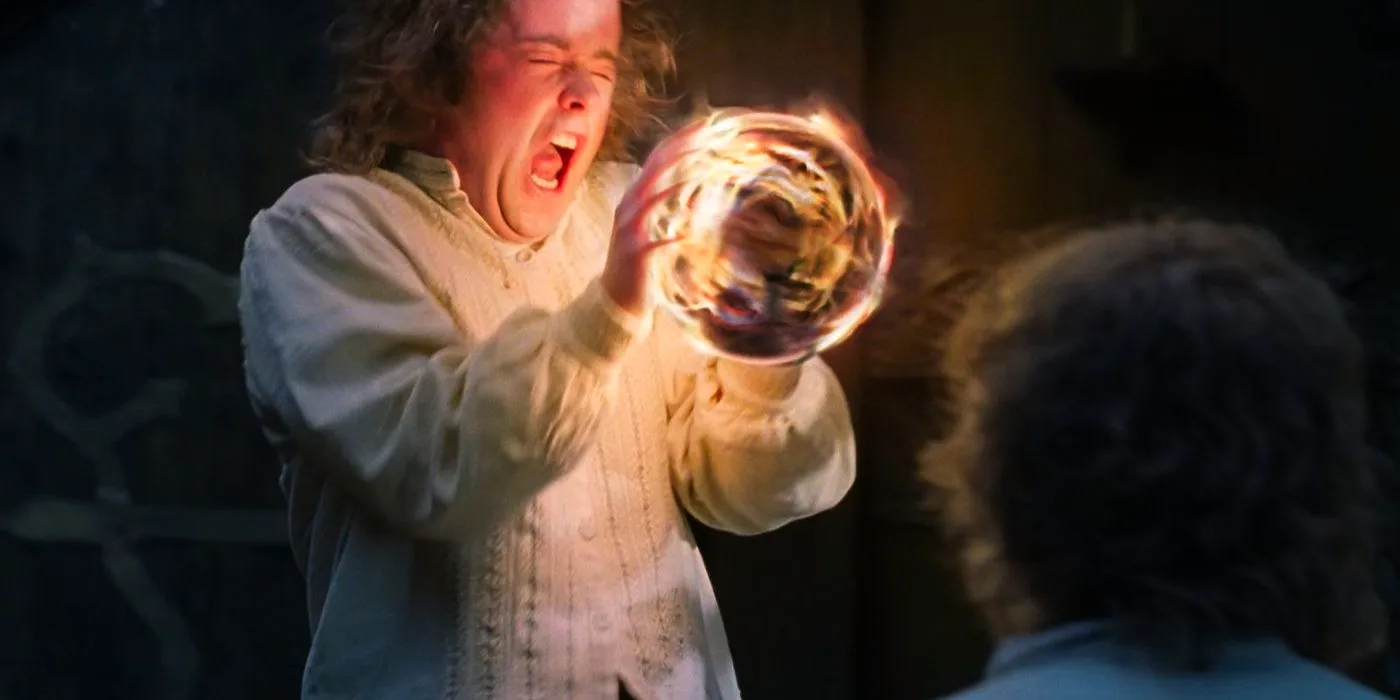 Pippin screaming while holding the Palantir in Lord of the Rings.  Image