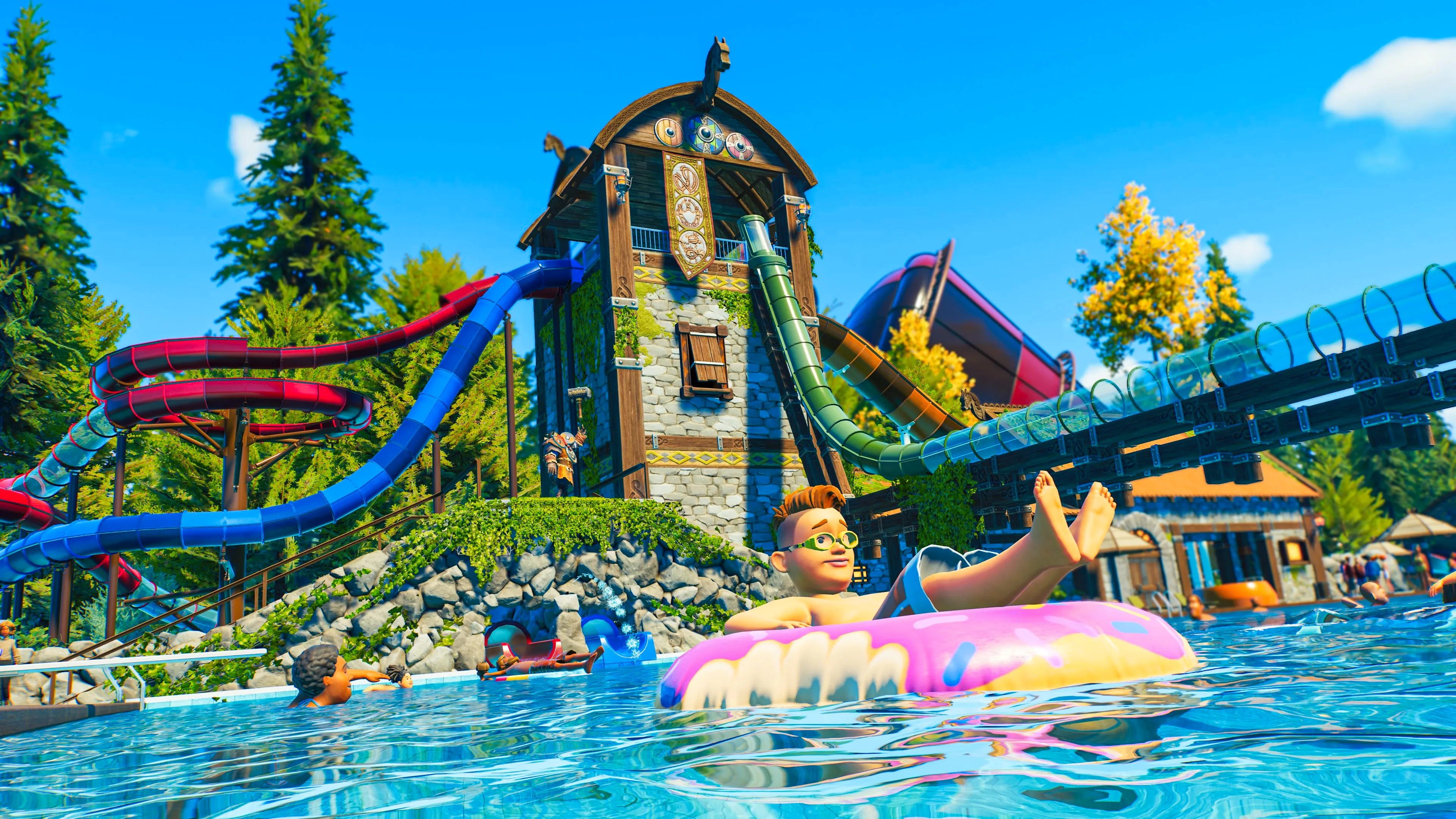 Planet Coaster 2 Viking Set pieces showing with flumes coming out, and a child on a donut inflatable in the pool below. Image