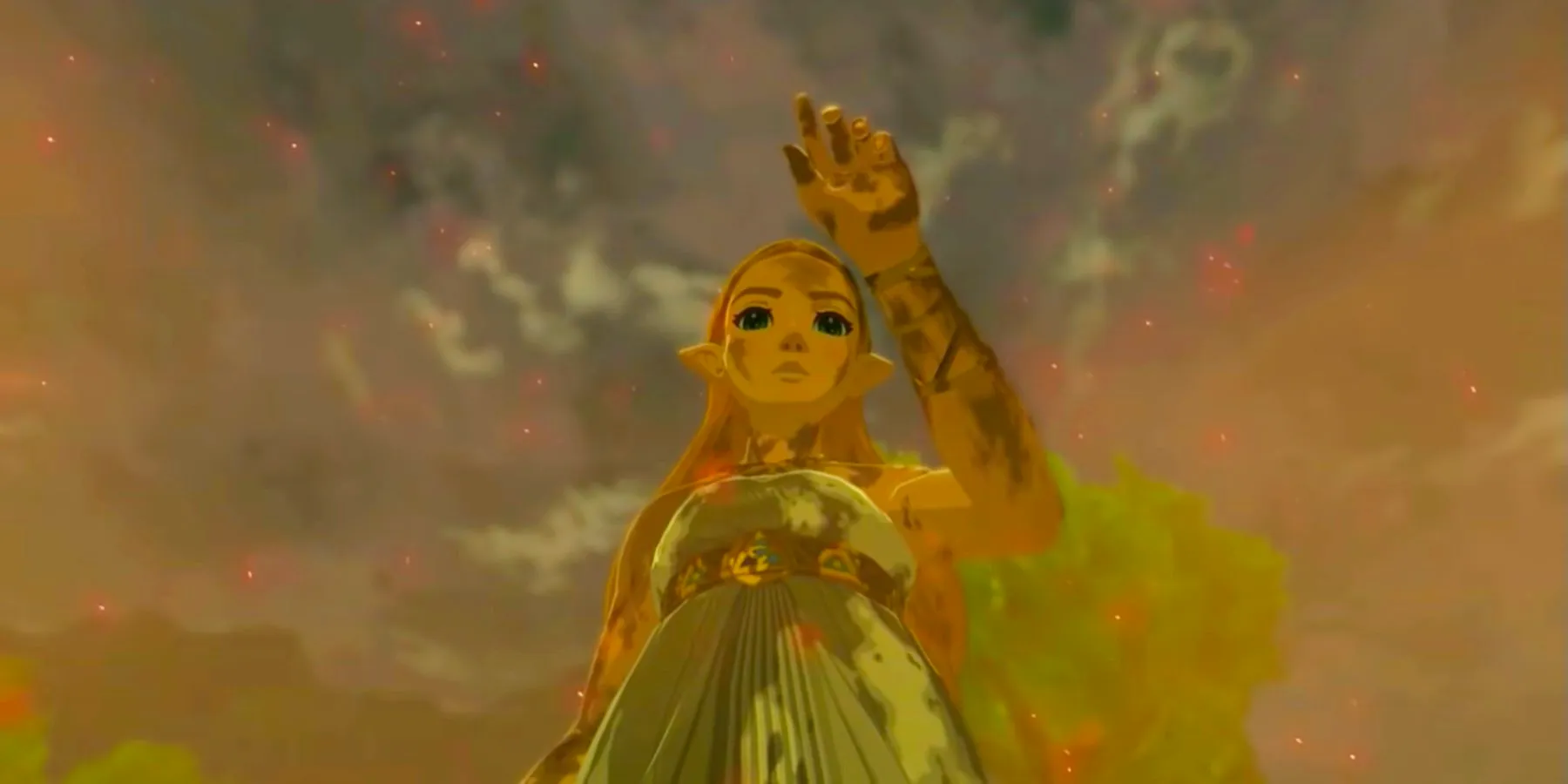 Princess Zelda looking at her hand after awakening her powers in BOTW. Image