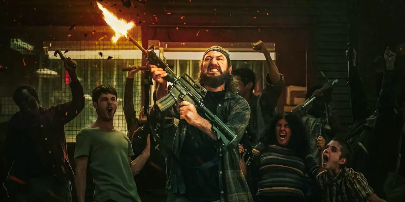 Prisoners firing guns in a cell in The Longest Night. Image