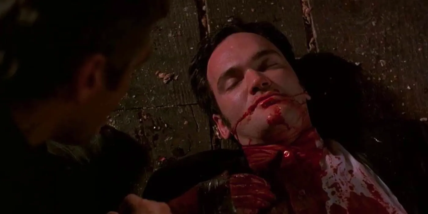 Quentin Tarantino as Richie dead on the floor in From Dusk Till Dawn Image