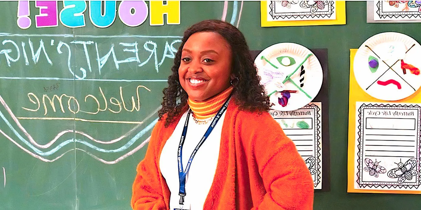 Quinta Brunson's Janine smiles in front of a blackboard in Abbott Elementary Image