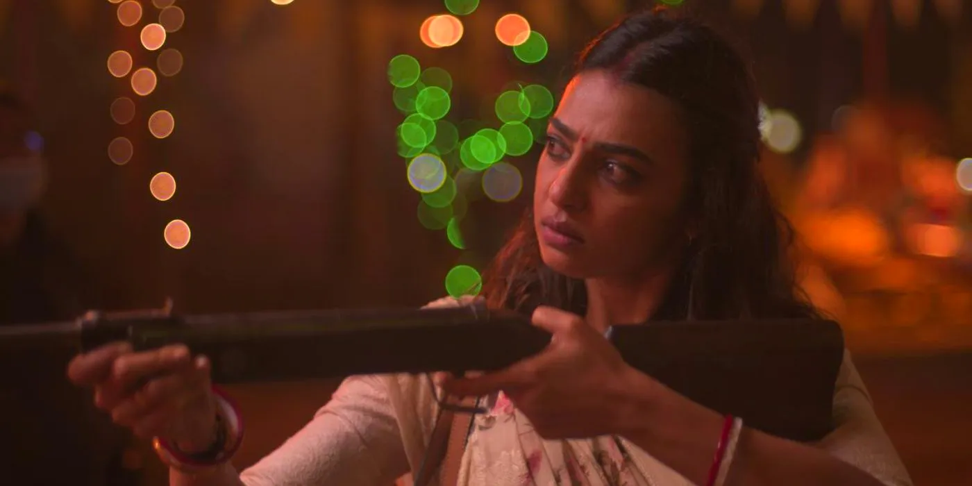 Radhika Apte as Durga pointing a gun in Mrs Undercover. Image