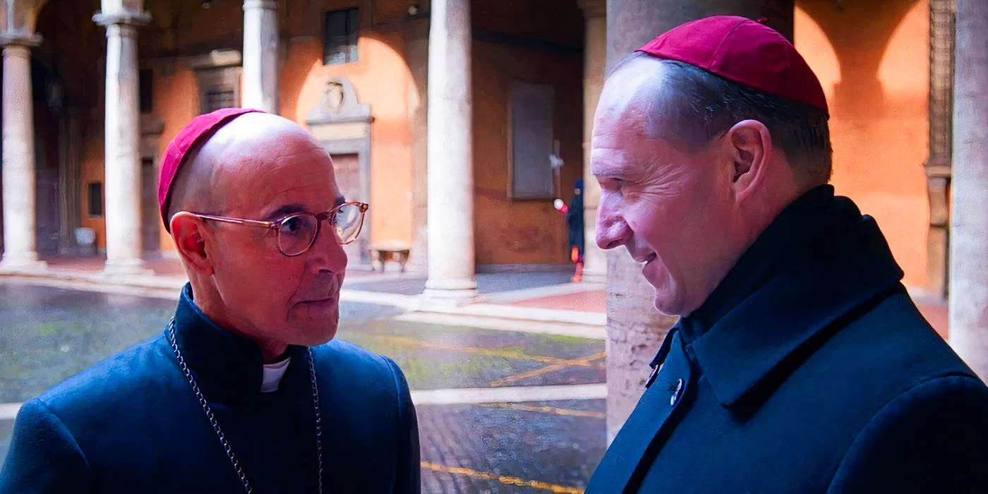 Ralpha Fiennes and Stanley Tucci standing close together talking in Conclave Image