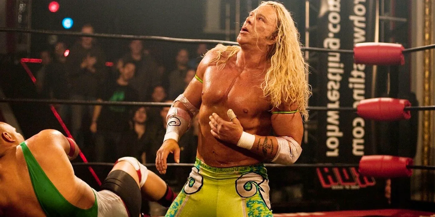 Randy The Ram holds his ribs while fighting in the ring from The Wrestler  Image