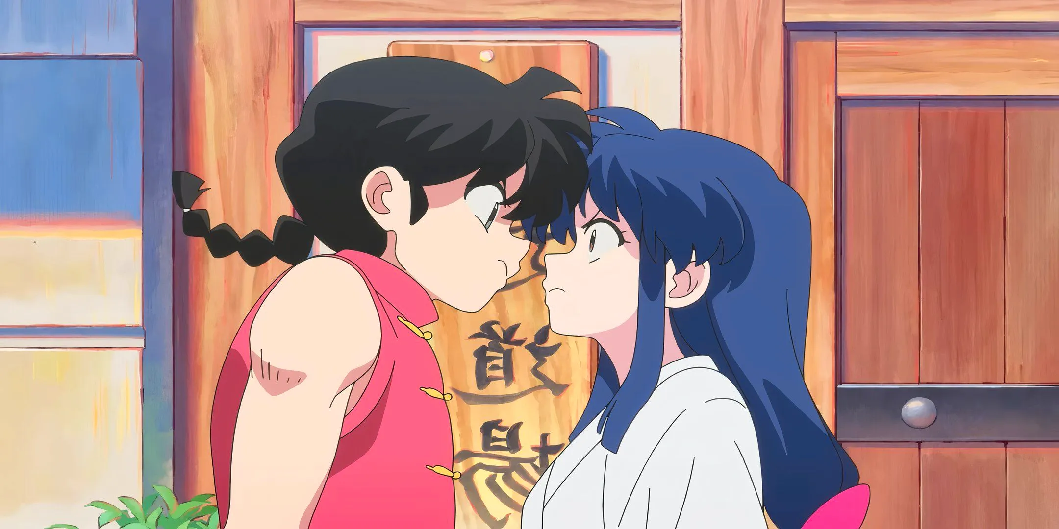 Ranma and Akane looking at each other in annoyance in the remake Image