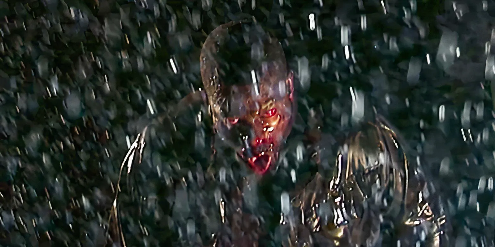 Red eye zombie in 28 Days Later stares through rain with an open mouth Image