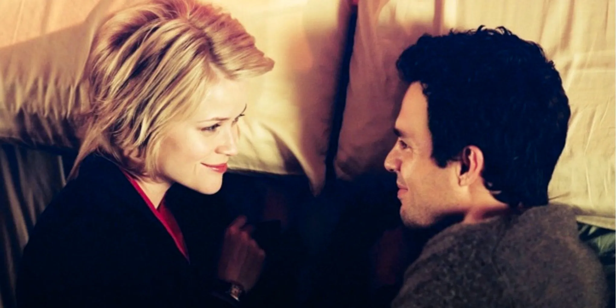 Reese Witherspoon laying next to Mark Ruffalo in Just Like Heaven Image