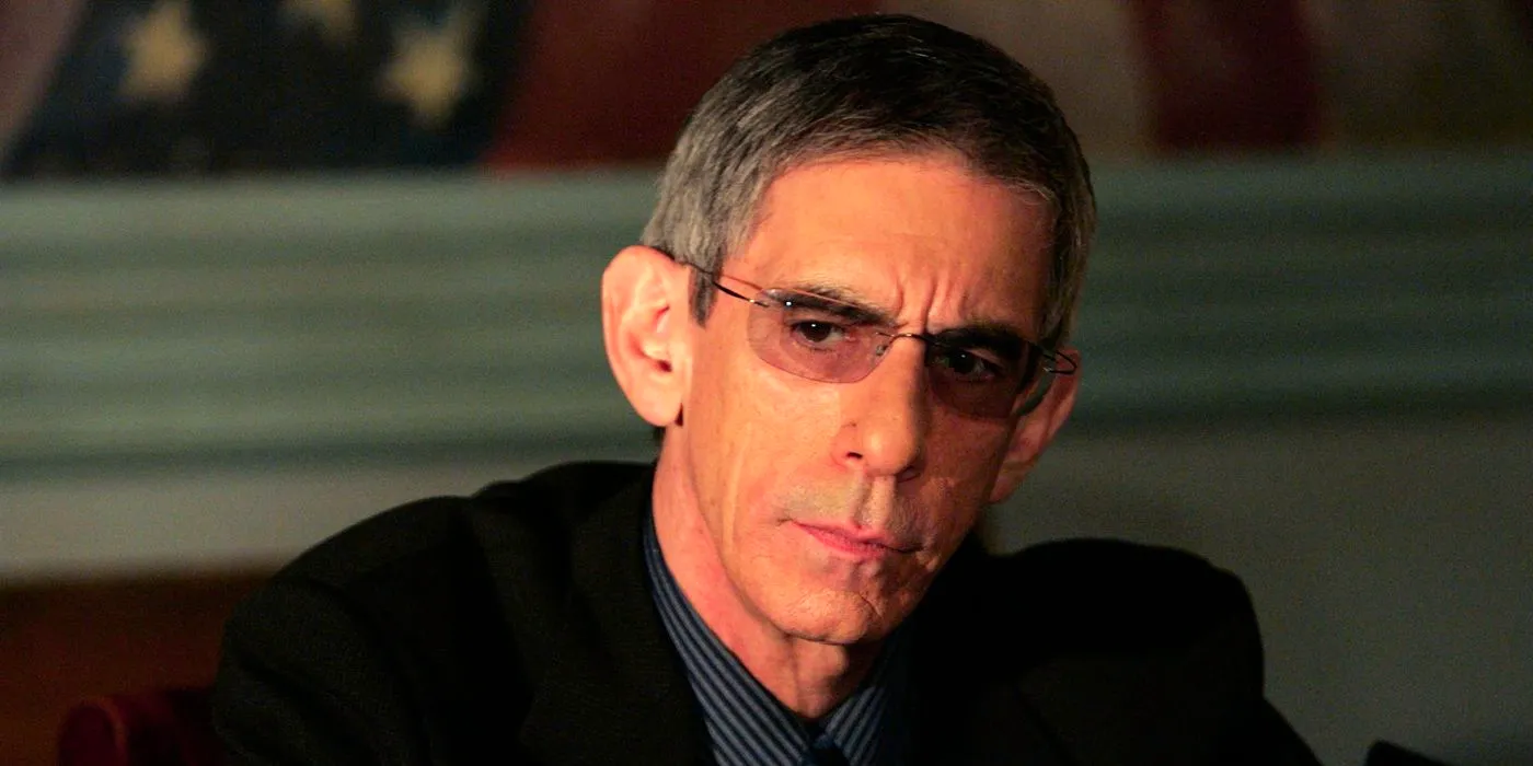 Richard Belzer looking somber in Law and Order Image